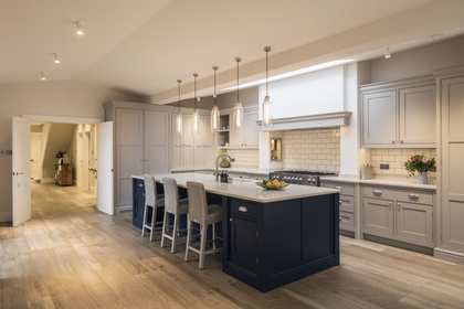 Kymarn Construction kitchen renovation with navy blue island