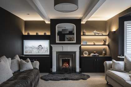 Kymarn Construction lounge renovation with fireplace detail