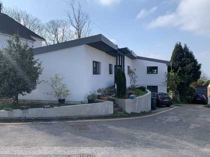 Kymarn Construction white rendered house exterior renovation